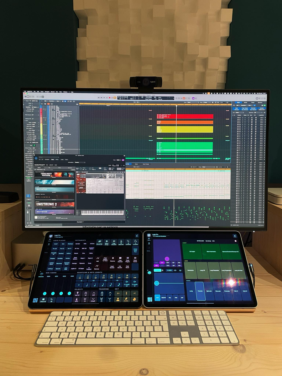 Stan's dual iPad setup with MetaGrid Pro grids alongside Logic Pro on the main monitor